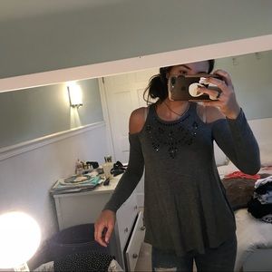 Opened shouldered long sleeve shirt